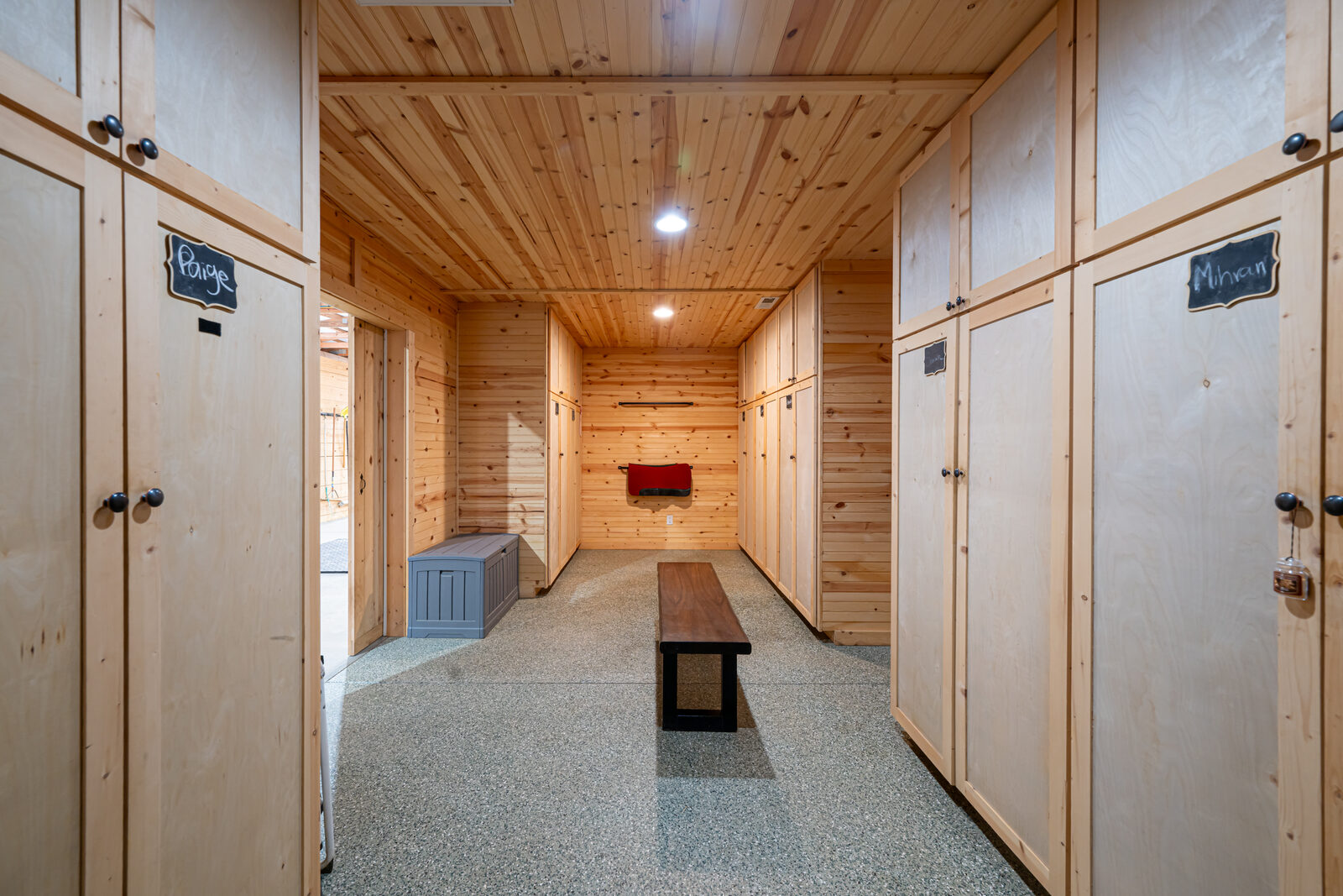 Custom cabinet-grade tack room with 10 lockers